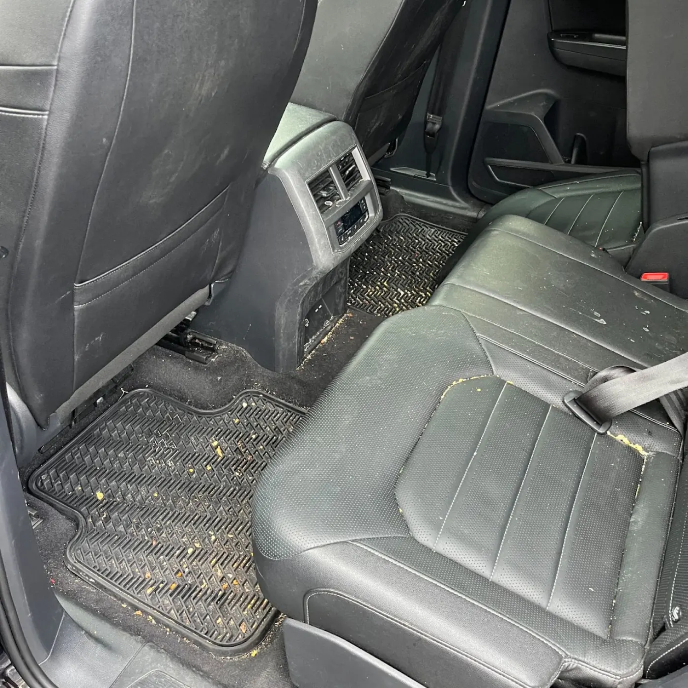 Before — vehicle interior with stains and dirt